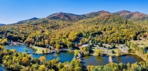 Drone view of Lake Eden valley with ponds and campers.